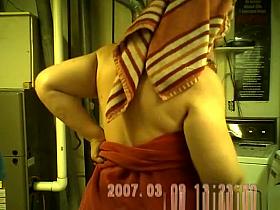 Mature chubby woman drying her body