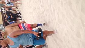 Walking with thong on beach