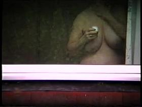 mature neighbor putting on creme