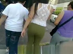 Teen in green tight pants