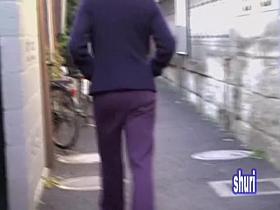 Asian babe gets her pants pulled by a street sharker.