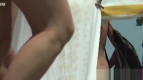 Naked hot babes enjoying a sunny day at the beach