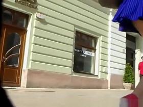 Girl wearing short blue skirt upskirt