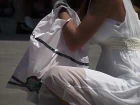 Cute girl in a white summer dress