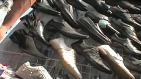 Black thongs girl walks around the streets while a voyeur films her ass