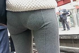 Curly haired nudist on the beach