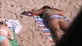 candid beach crotch shot 181, standind right over her