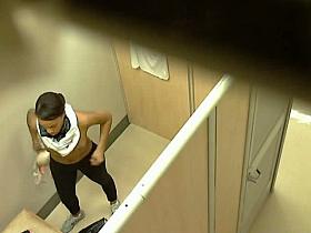 Black chick with a big ass filmed while trying on bras