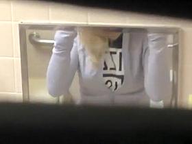 Voyeur films blonde girl peeing