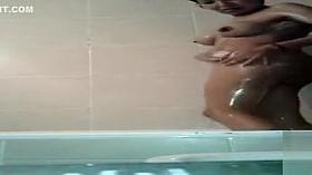 Curvaceous beauty washes her attractive body