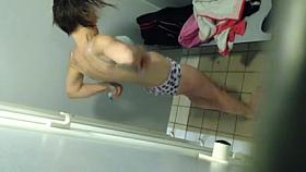 Woman changing after swimming