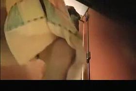 Woman spied drying and dressing