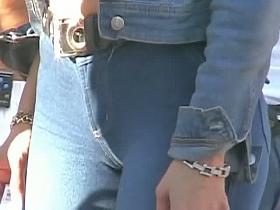 Bombshell in tight jeans stars in a hot candid street video