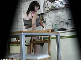 Caught woman masturbates in kitchen