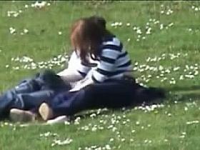 Sex in public spy cam captures a horny girl jerking her bf