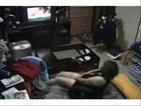 My mom fingering while she is watching porno