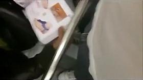 Lady on the train fondles my cock through jeans