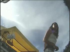 Voyeur video of a dark haired hottie showing her incredible ass