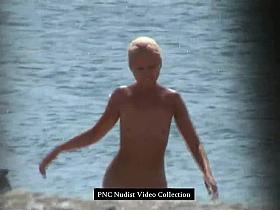 Hot blonde shows her naked hairy pussy on the beach