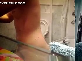 Teen spied peeing and dressing