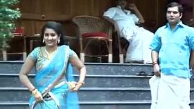 Actress navya nair navel show captured in pen cam by driver