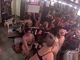 Strippers in change room counting money