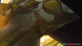 Outlandish upskirt of angel in yellow costume