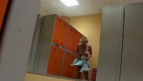 Naked milf rubs oil all over herself