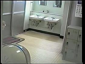 Asian female walking all naked on change room spy cam