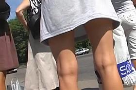 lady in skirt looking for coach