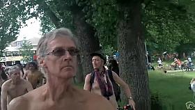 Ambitious men and women riding their bikes naked