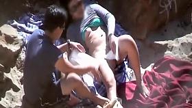 Shy couple fucking on a beach