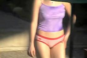 Sweet amateur pulls top down and flashes nude boobs