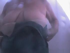 Chubby mature woman caught in beach cabin