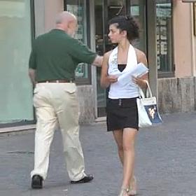 Braless street cute girl walking and bouncing