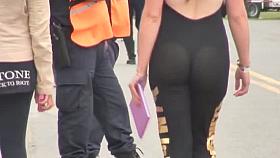 Gorgeous ass in tight clothing at the auto show