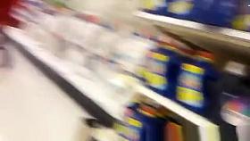 Red shorts chick at supermarket