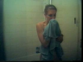 Slender cutie caught naked on a shower spy cam