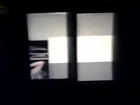 woman spy topless window