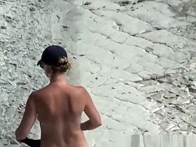 Big tits nudist woman with shaved pussy