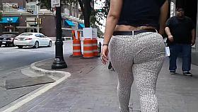 Plump bottom going through the streets
