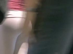 Two college chicks, one a 9, in a voyeur street candid porno