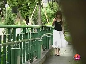 Asian babe in a long white skirt gets street sharked.