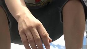 Classy curvaceous lady in a black miniskirt has her panties revealed