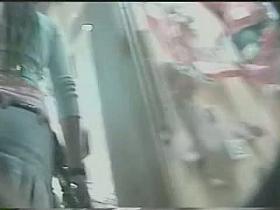 Upskirt voyeur video features a slim chick with a tasty bum.