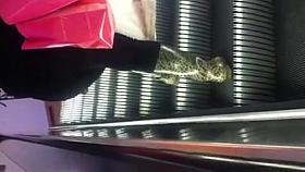 Big booty Mexican on escalator