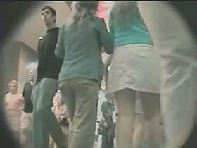 A fat milf gets followed around the city streets by a nasty voyeur and his hidden cam