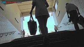 Dark-haired babe caught on the upskirt camera