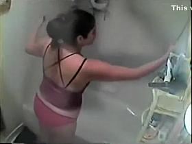 Spying her while she showers off