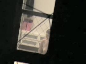 Girl strips and touches nude tits on window voyeur movie